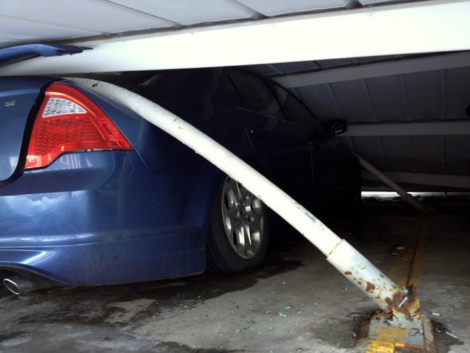 5 cars crushed after drunk driver topples carport, police say