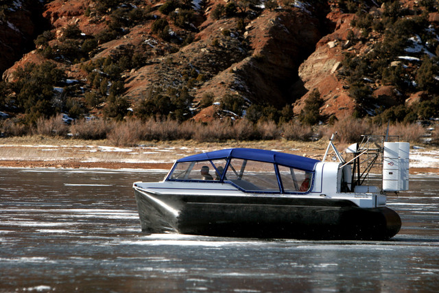 A Daggett County sheriff's pilots the agency's hovercraft on Flaming Gorge Reservoir. A woman is dead and search efforts continue for her adult daughter after she failed to resurface while recreating at Swim Beach on Flaming Gorge Reservoir on Saturday. 