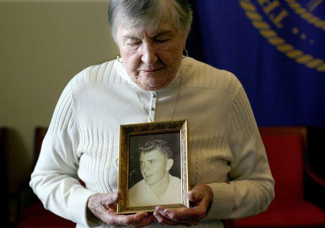 Alice Telford holds a photo of her son, John W. Telford, who was raised in Salt Lake City and killed in action during the Vietnam War at the Capitol on Wednesday, Feb. 20, 2013. Telford is donating the photo to the nationwide Faces Never Forgotten campaign. (Photo: Laura Seitz, Deseret News)