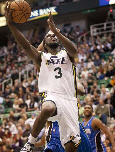 Jazz forward DeMarre Carroll (3) goes for a layup (Ben Brewer, Deseret News)