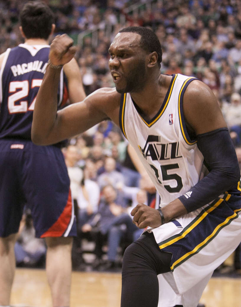 Utah's Al Jefferson pumps his fist after a made basket as the Jazz and the Hawks play Wednesday, Feb. 27, 2013 in Energy Solutions arena. Jefferson has missed the three previous games, all Jazz losses. (Scott G Winterton/Deseret News)