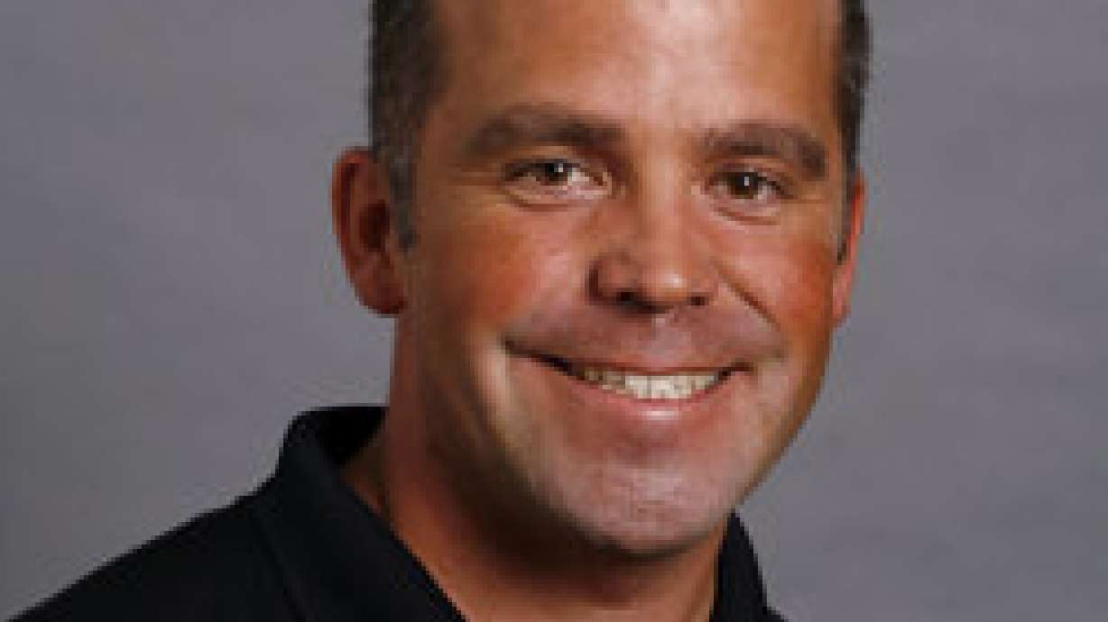 Charges dismissed against former U swim coach