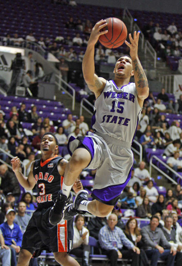 Weber State wing Davion Berry drives to the hoop against Idaho State. Berry was named a member of the first All-Conference team.