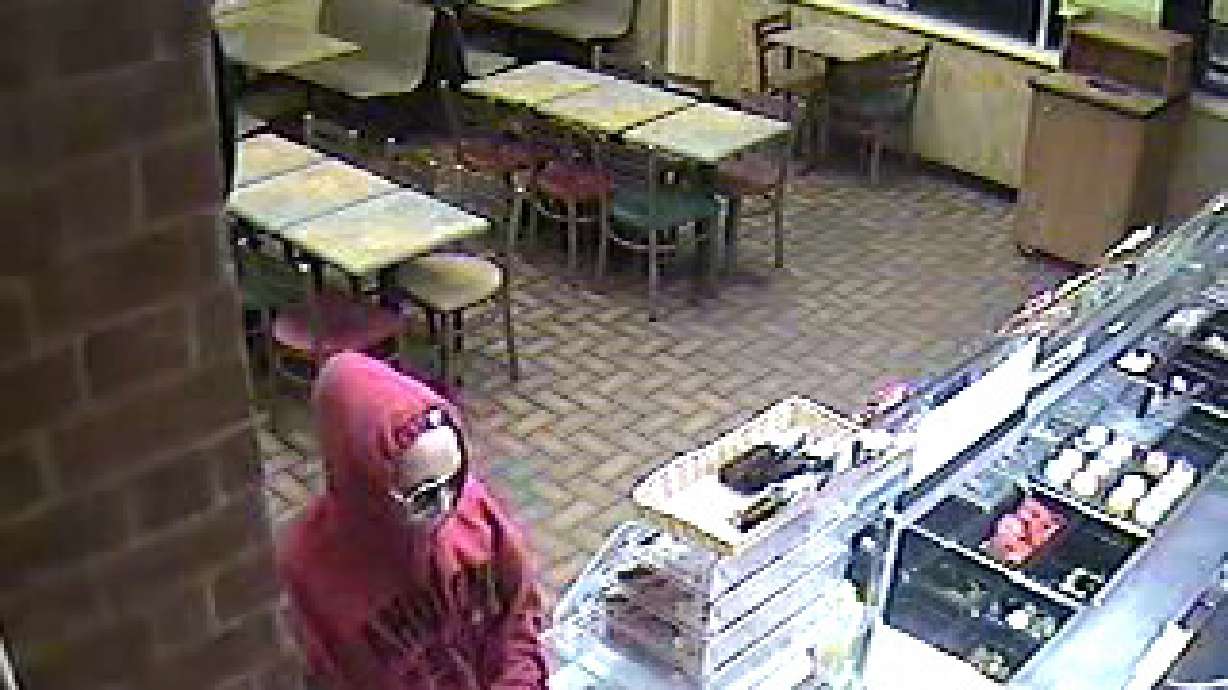 Photos released of alleged female restaurant robber