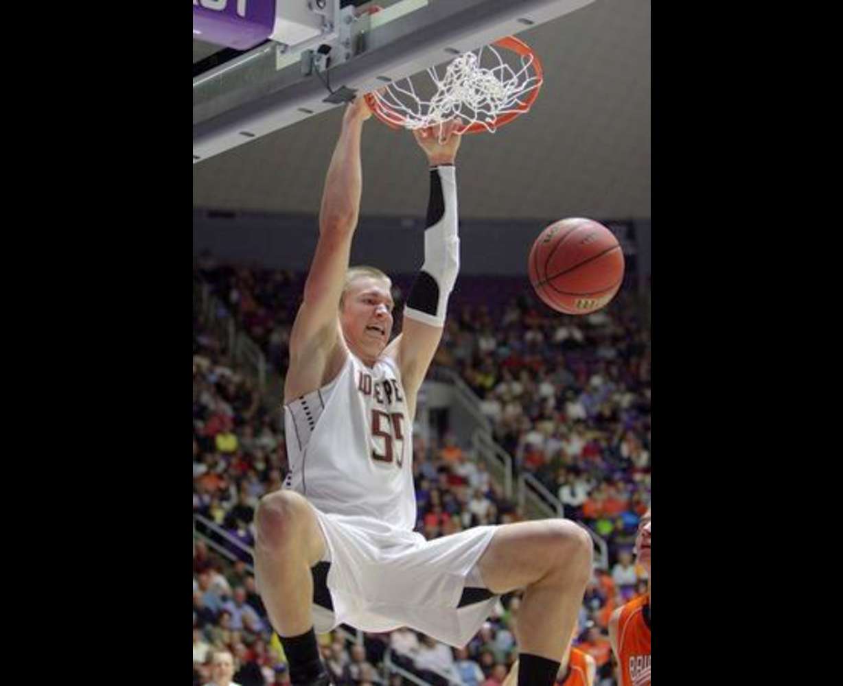 Lone Peak's Eric Mika slams on Brighton during the 5A state semifinals in Ogden Friday, March 1, 2013. (Jeffrey D. Allred, Deseret News)