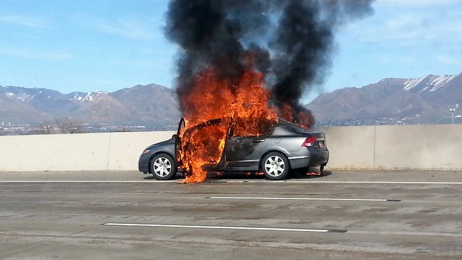 Car destroyed in fire on I-15
