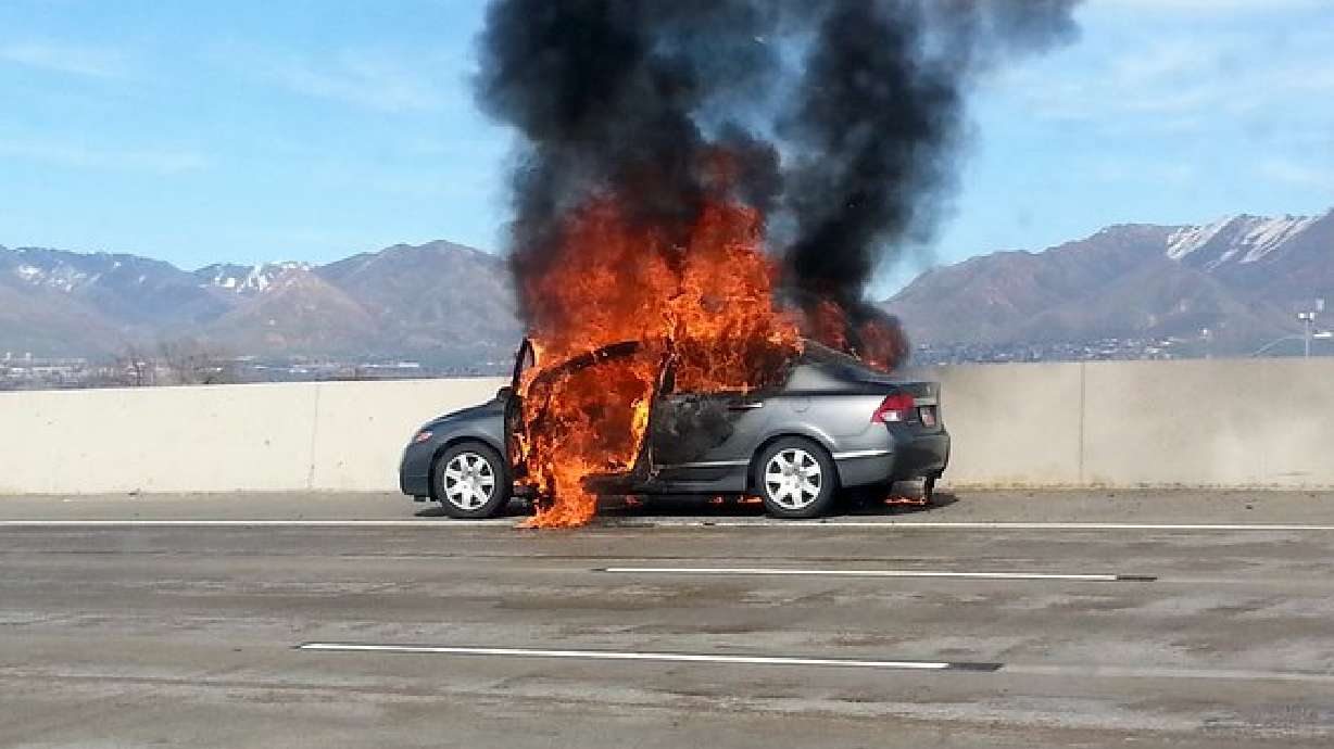 Car destroyed in fire on I-15