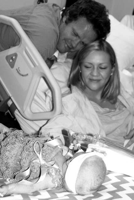 Ben and Andrea Olson with their daughter, Clara Michele. She was born May 2012 with a rare genetic disorder that caused her kidneys to fail, and her lungs to be underdeveloped. (Photo: Olson family)