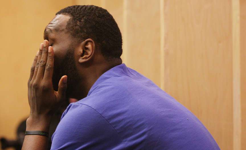 Utah Jazz center Al Jefferson (25) sits at his locker as the Jazz players clean out their lockers for the season in Salt Lake City Thursday, April 18, 2013. (Submission date: 04/18/2013)