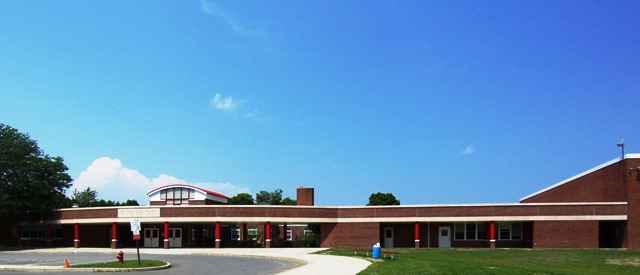 School, media squabble over gender identity presentation