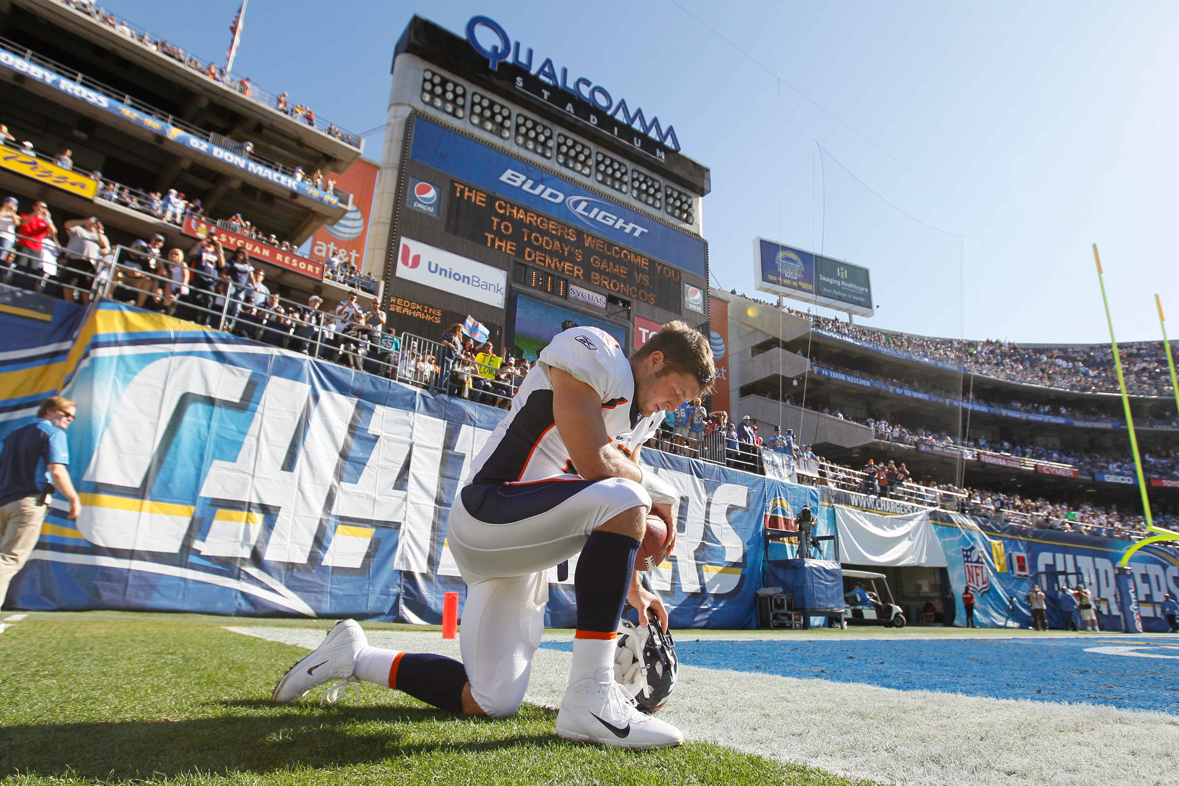 Tim Tebow takes a moment to pray before playing the San Diego Chargers on November 27, 2011. (NFL Photo)
