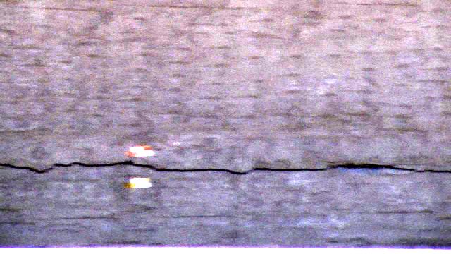 The cold temperatures that held steady this winter contributed to these cracks along the road.