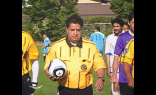 Ricardo Portillo referees a soccer game (Photo: Portillo family)