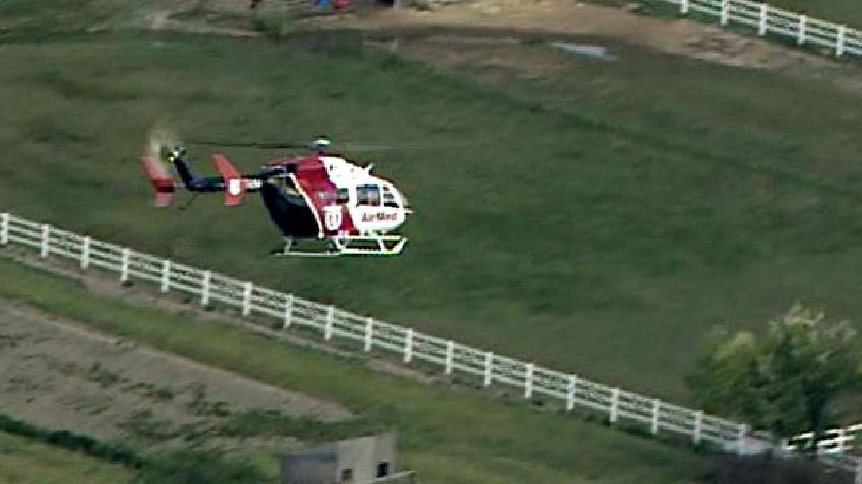 Man critically injured after car rolls over him