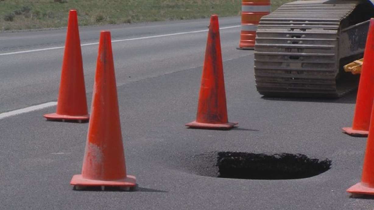 16-foot deep sinkhole swallows part of I-80 near Wyoming border