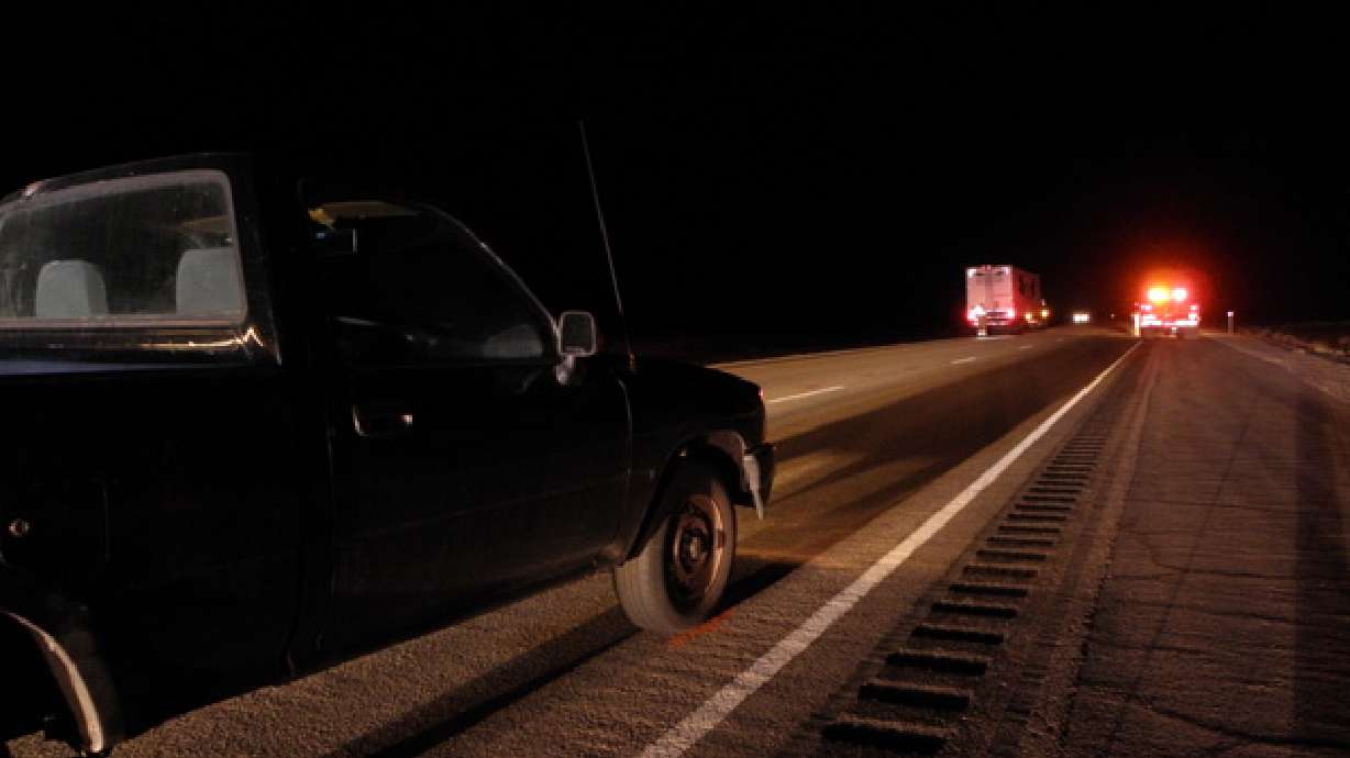 Driver who exited vehicle on freeway hit by truck