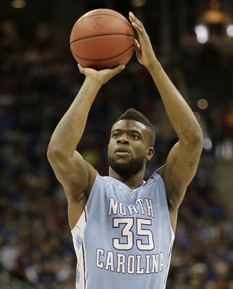 File photo of North Carolina guard/forward Reggie Bullock (35) shooting during the first half of a third-round game against Kansas in the NCAA college basketball tournament, March 24, 2013, in Kansas City, Mo. (AP Photo/Charlie Riedel)