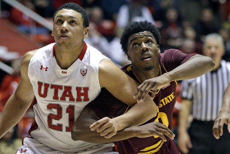 Utah's Jordan Loveridge (21) and ASU's Carrick Felix (0) battle under the boards in the second half. (AP Photo/Rick Bowmer)