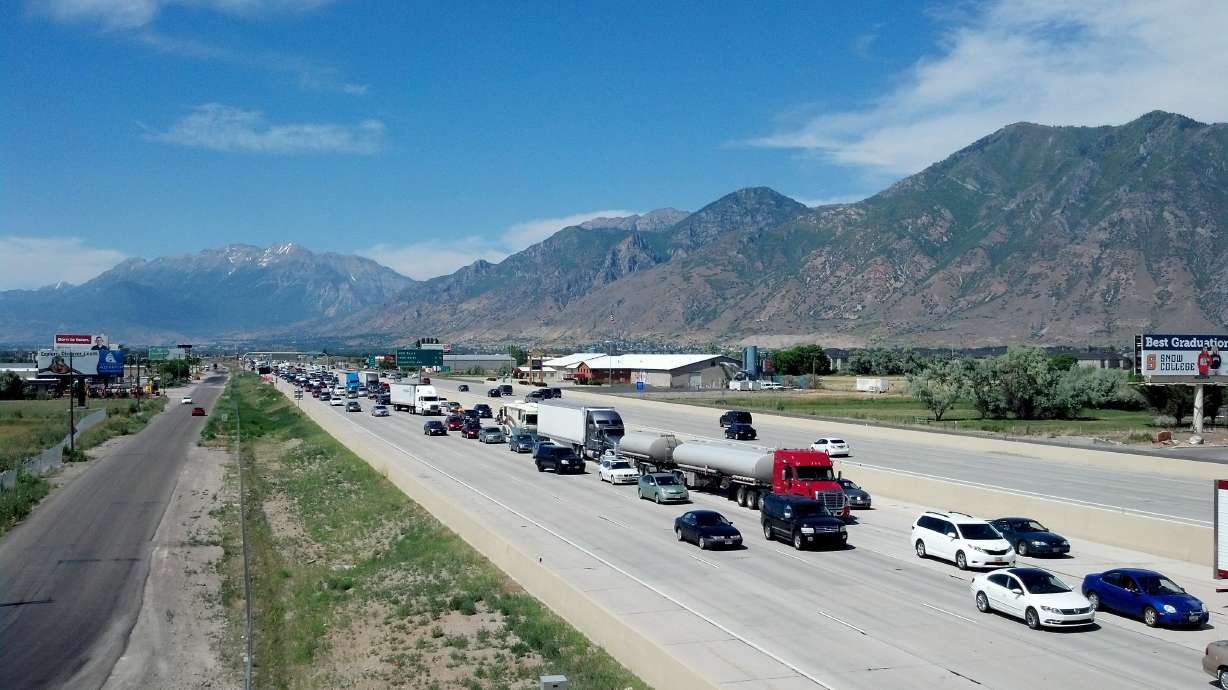 Toppled apple truck leads to hospitalized motorcyclist