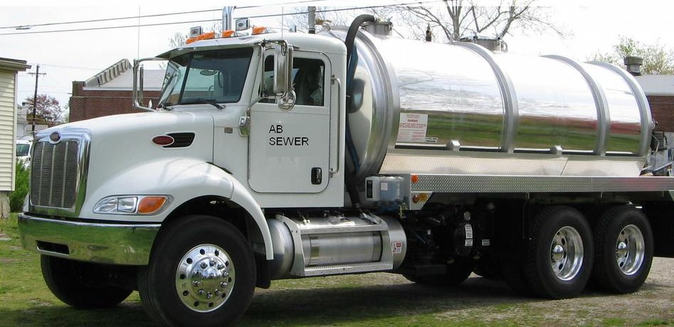 Company accused of cleaning septic tank, dumping waste in yard