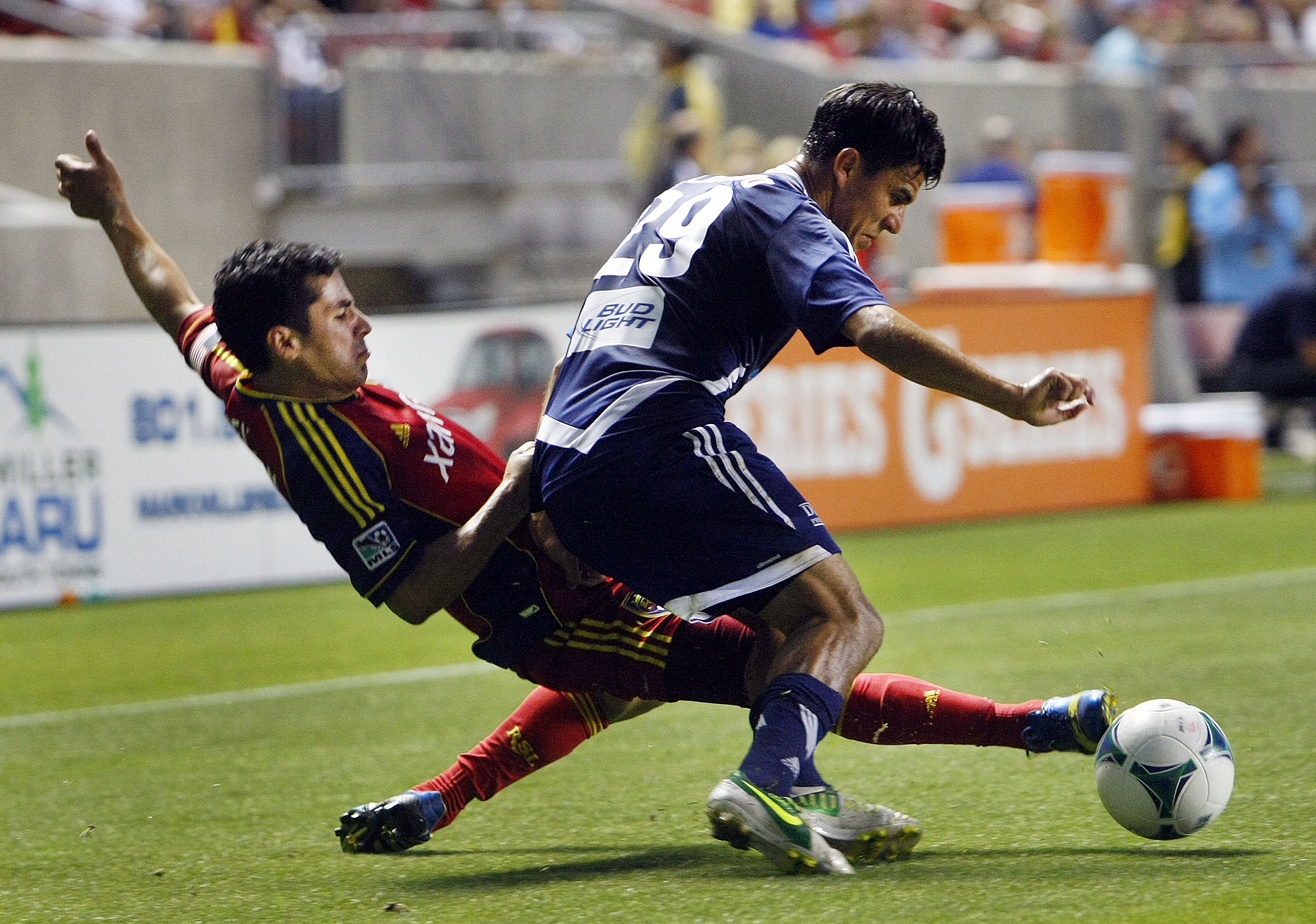 Real's Tony Beltran battles with Cesar Elizondo for the ball as Real Salt
lake and Carolina RailHawks play Wednesday, June 26, 2013 at Rio
Tinto Stadium in Sandy. Real won 3-0.