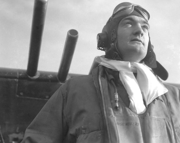 Grant Turley poses in front of his P-47, with two of the planes .50
caliber machine guns visible behind him. (Photo: Wanda Smith)
