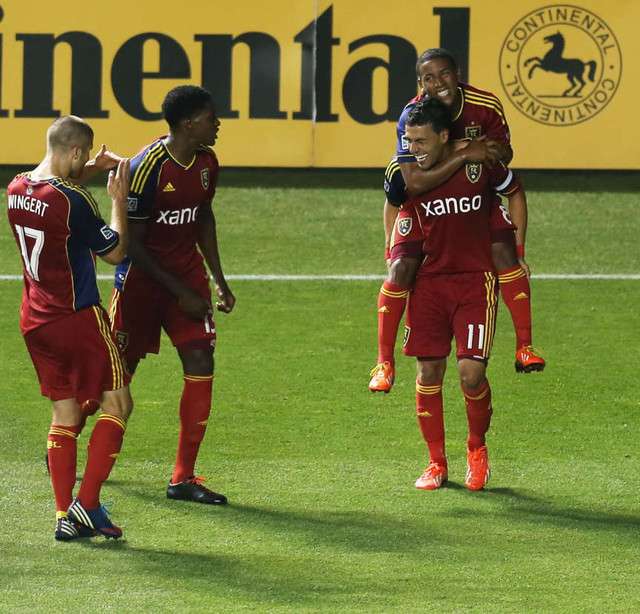Real's Javier Morales celebrates the game tying goal with teammates as
Real Salt lake and the Philadelphia Union play to a 2-2 tie Wednesday,
July 3, 2013 at Rio Tinto Stadium. (Scott G Winterton, Deseret News)