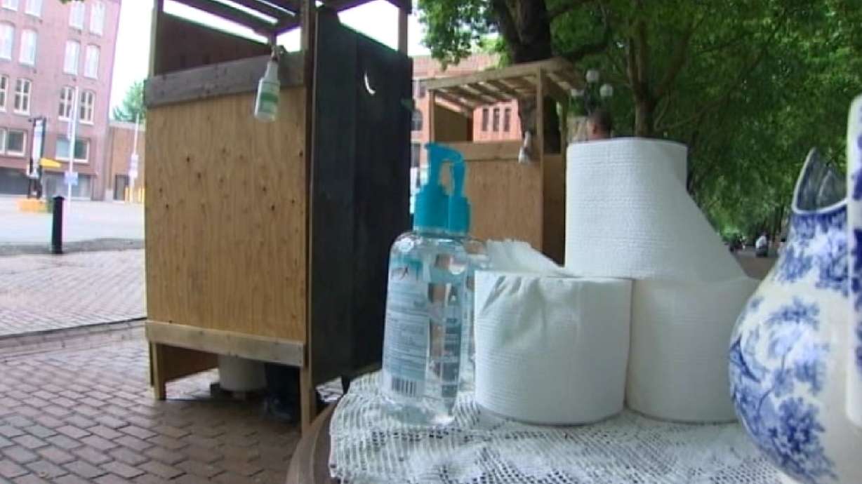 Tired of public urination, businesswoman builds outhouses