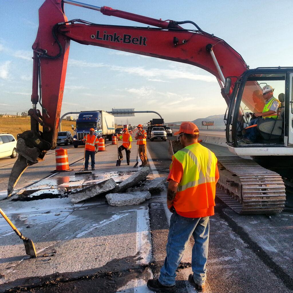 Road buckles, closing 2 NB lanes on I-15
