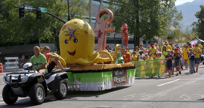 Marching band music, miniature covered wagons
made out of plastic kid's wagons and floats
kicked off pioneer-themed events Saturday.