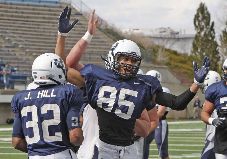 USU's Brandon Swindall celebrates during Utah State Aggies football practice Thursday, March 28, 2013, in Logan. (Tom Smart/Deseret News)