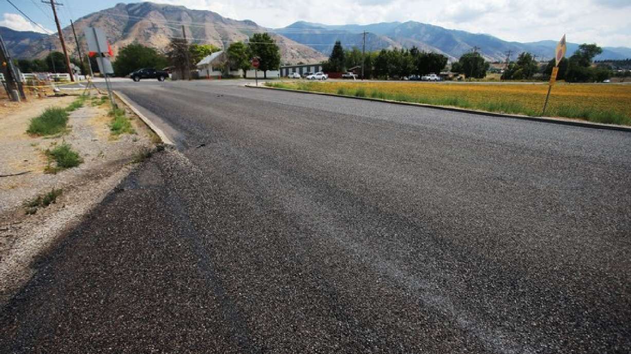 The Cache County assessor who brought a lawsuit against the North Logan City Council is involved in a yearslong heated dispute with the council over his quarter-acre property.