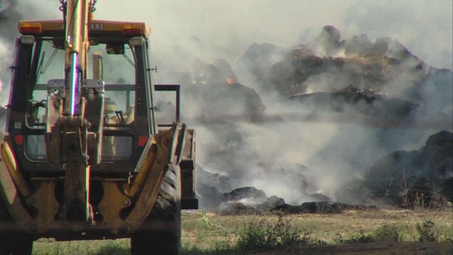 Firefighters allow large haystacks to burn after accidental fire