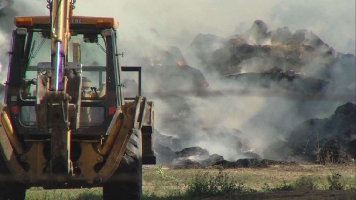 Firefighters allow large haystacks to burn after accidental fire
