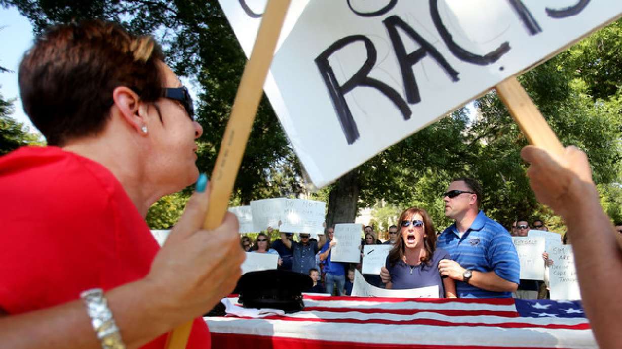 West Valley detective's wife stands by husband in heated debate