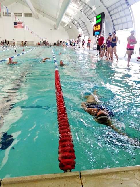Some 400 swimmers tried for their best time in the Kearns Oquirrh
Park Fitness center pool as part of the TriathaMOM sprint triathlon
Saturday morning. (Photo: Kristin Sokol, TheVocalSokol.com)