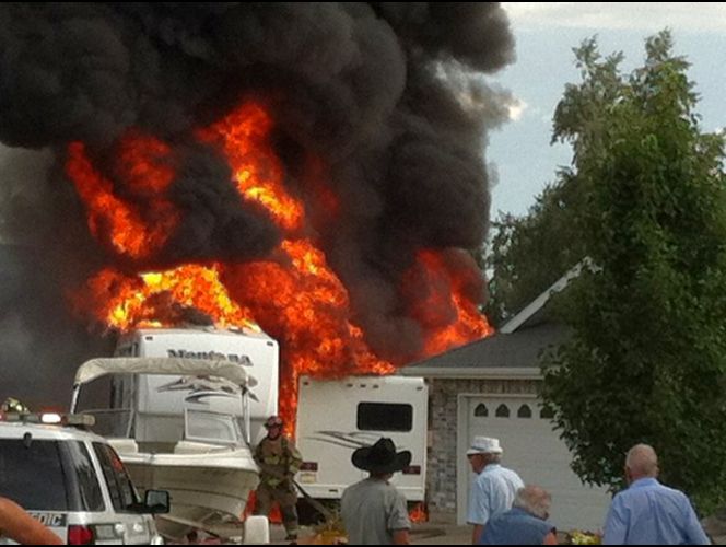 Fire consumes 3 RVs, damages home in retirement community