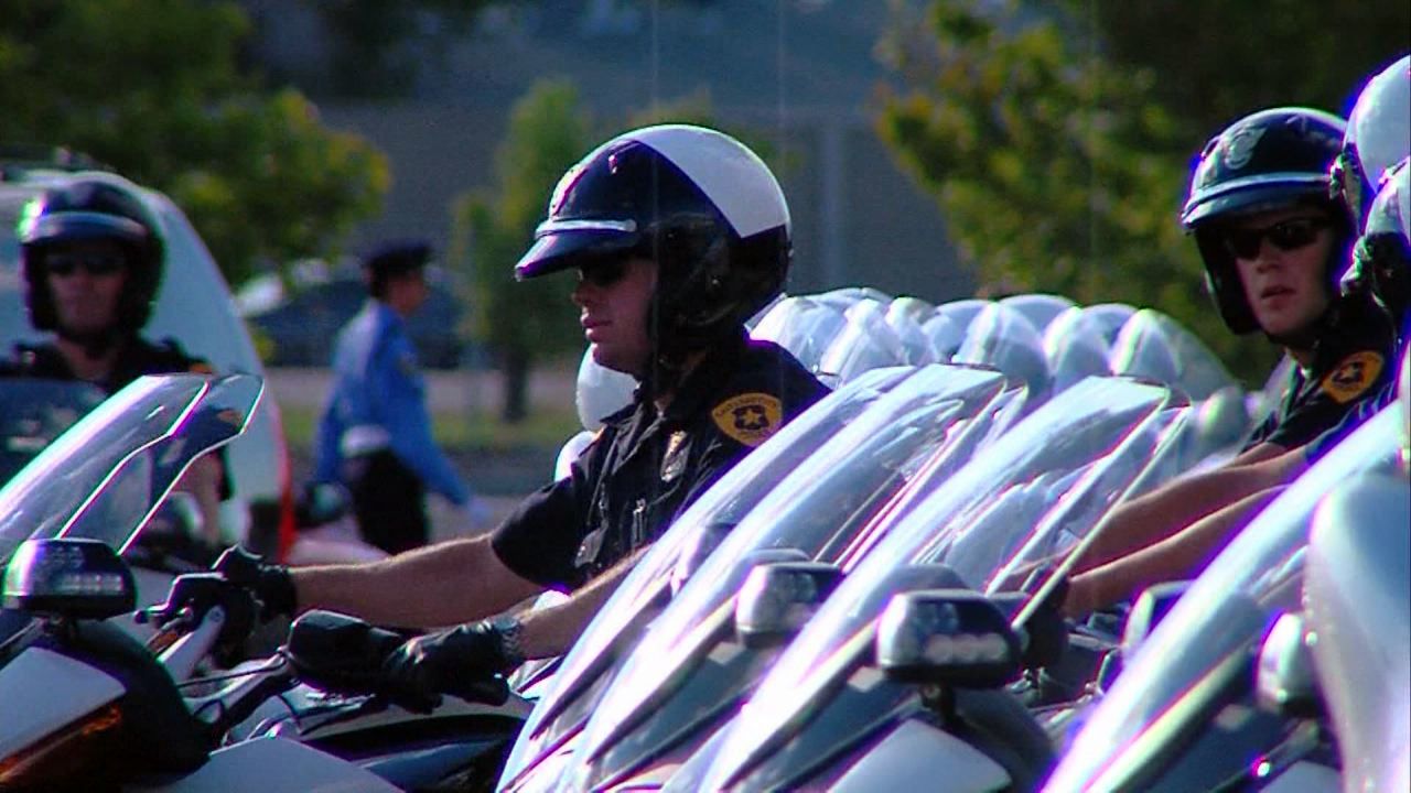 Draper Police officers honoring Sgt. Johnson