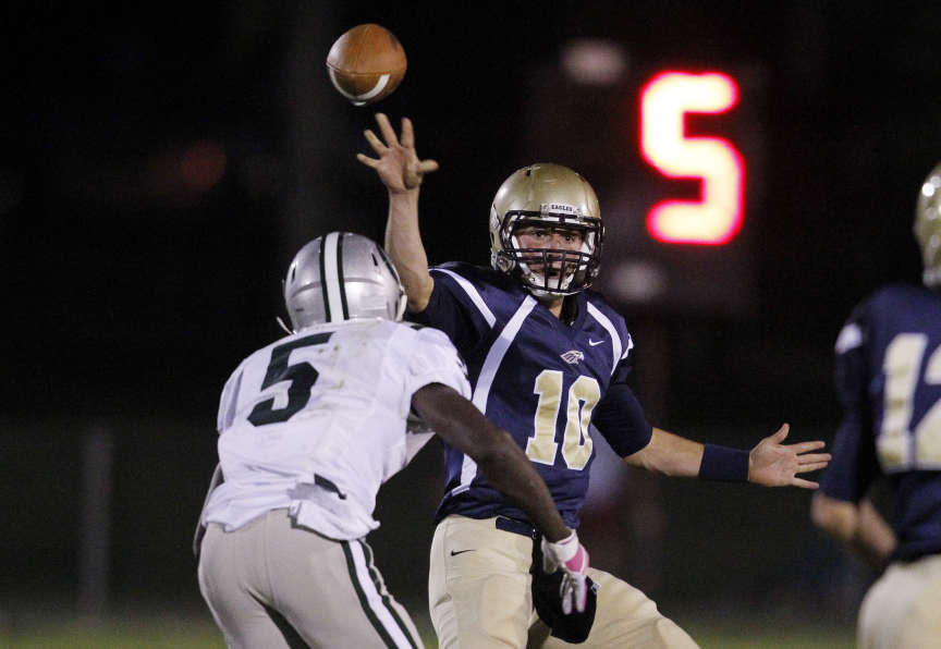Skyline QB Zac Williams against Olympus' Brandon McBride in prep
action in Salt Lake City Friday, Oct. 14, 2011. (Submission date:
10/14/2011)