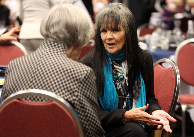 Pamela Atkinson, left, talks to Sherilyn
Horrocks, who has progressive systemic
sclerosis and does not qualify for Medicaid, at
the State of Utah Governors Health Summit at
the Salt Palace in Salt Lake City on Thursday,
Sept. 26, 2013. (Photo: Kristin Murphy, Deseret
News)