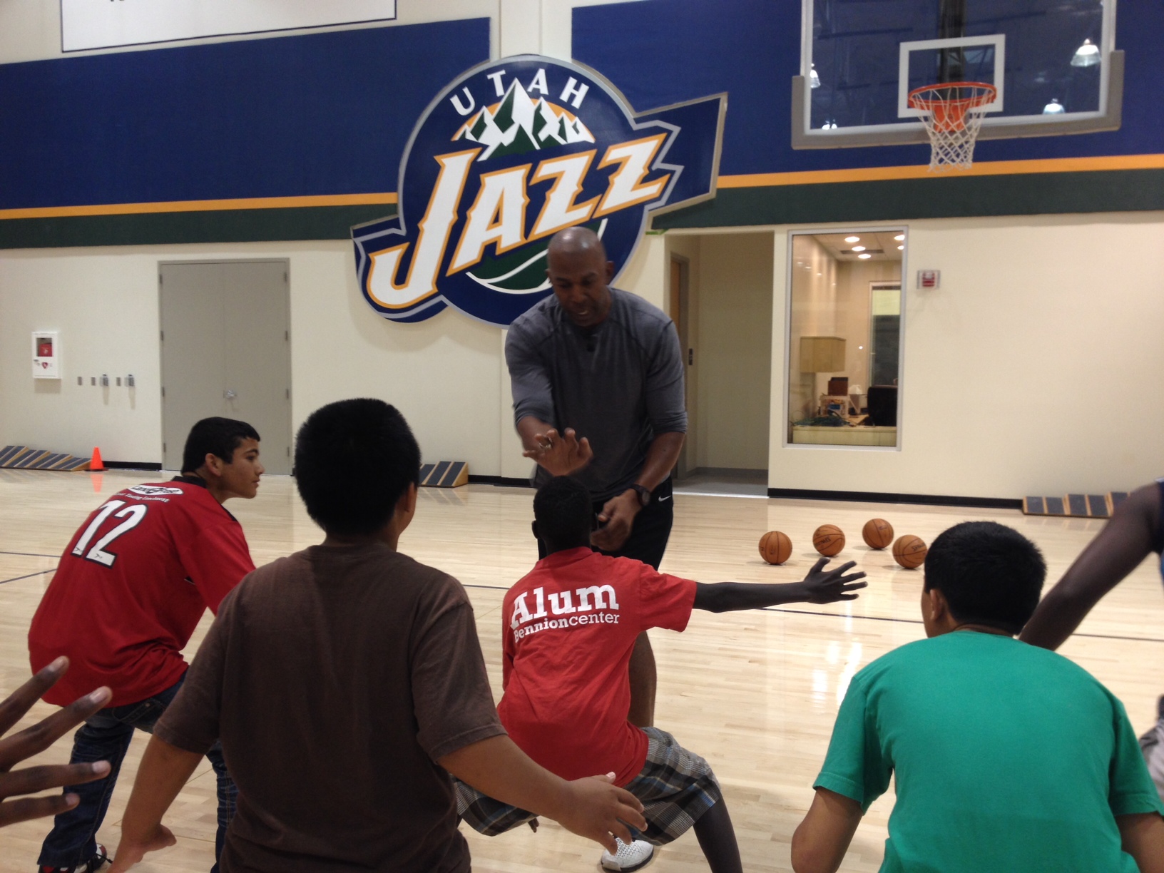 Young refugees get rare chance to hoop it up with Jazz players 