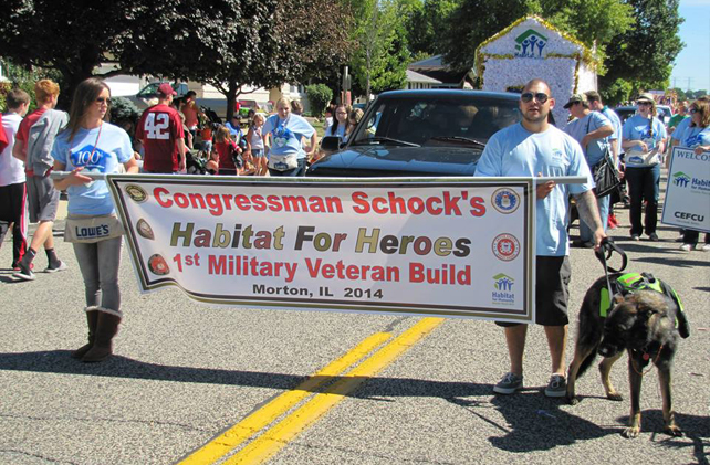 After backlash from neighbors, town pitches in to build vet a house