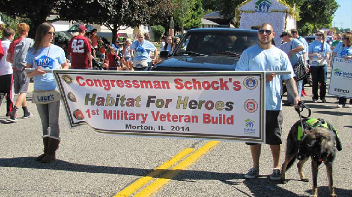 After backlash from neighbors, town pitches in to build vet a house