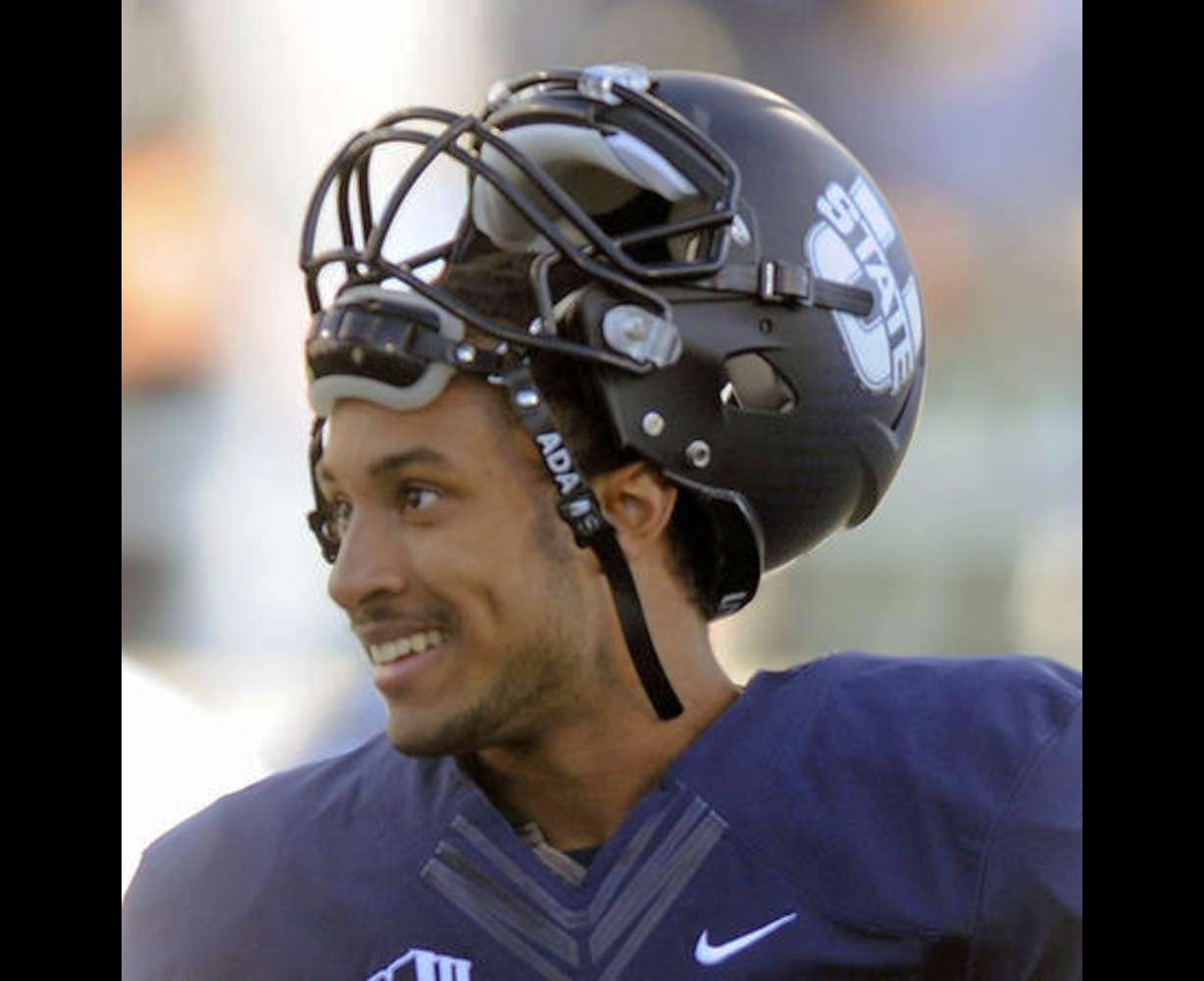 Utah State Quarterback Chuckie Keeton is all smiles before the start of the game against BYU at Romney Stadium on Friday, October 4, 2013. (Matt Gade, Deseret News)