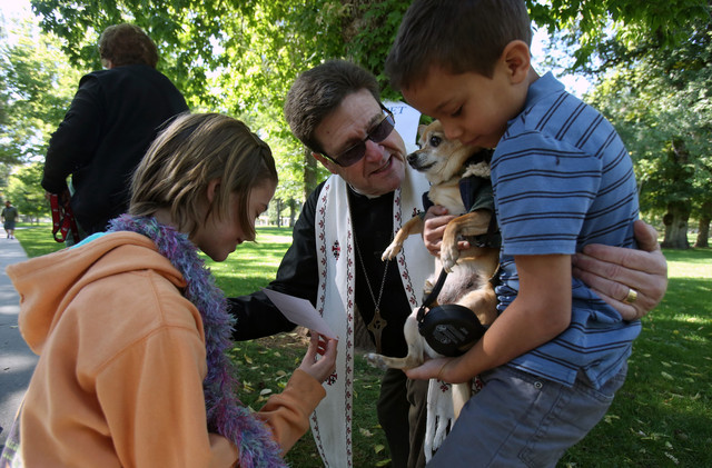 Utah reverend blesses pets with good health and companionship