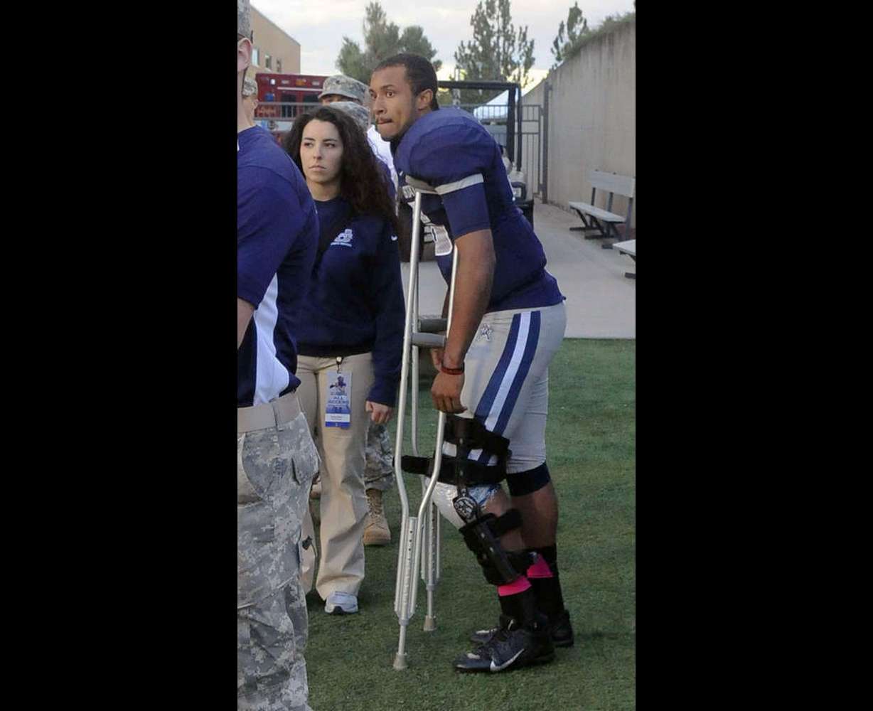 Utah State Aggies quarterback Chuckie Keeton (16) pauses to watch a
play before heading back to the locker room after an injury in the first
half against BYU at Romney Stadium on Friday, October 4, 2013.
(Submission date: 10/04/2013)