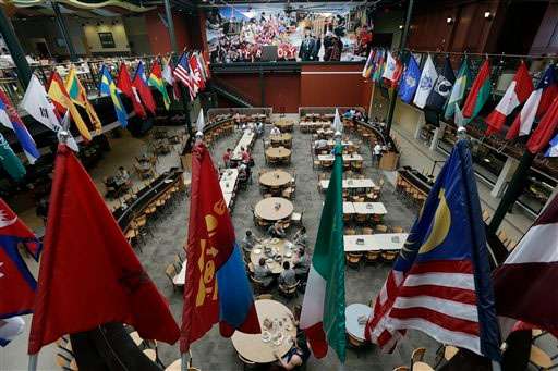 In this Oct. 1, 2013, photo, students gather in the Trojan Dining Hall on the campus of Troy University in Troy, Ala. Tucked in rural southeast Alabama, Troy University has opened something that's a rarity for a public college in the United States: A faith-based dorm community where daily Bible studies are common and beer drinking is strictly forbidden. (AP Photo/Dave Martin)