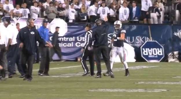 Spencer Hadley celebrates with Coach Bronco Mendenhall during the Georgia Tech game.