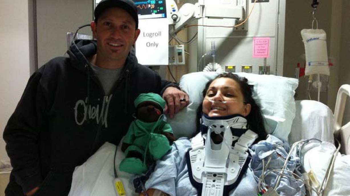 With support of husband, woman is determined to walk again