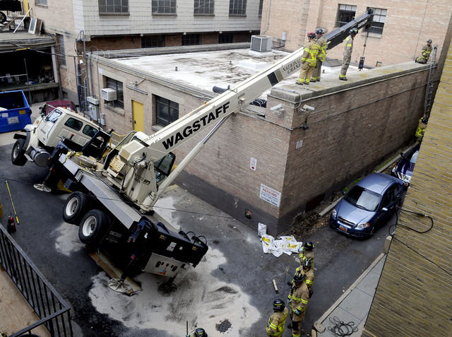 Tipped crane forces evacuations of 2 Salt Lake buildings 